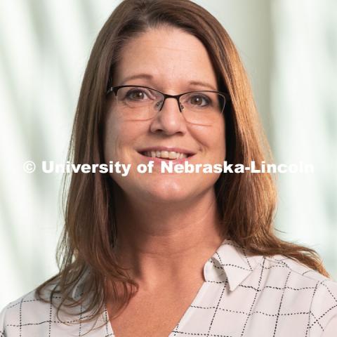 Studio portrait of Nicole Wood, Office Associate at CAPS (Counseling and Psychological Services. May 30, 2019. Photo by Greg Nathan / University Communication.