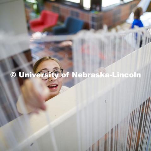 College of Architecture High School Workshop students use string to design in the atrium of the college. June 20, 2019. Photo by Craig Chandler / University Communication.