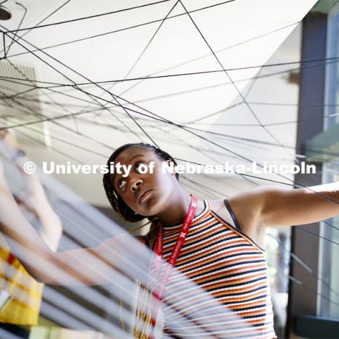 College of Architecture High School Workshop students use string to design in the atrium of the college. June 20, 2019. Photo by Craig Chandler / University Communication.