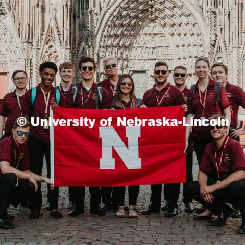 Future, Current, and Past Huskers in front of the Metz Cathedral in Munich, Germany. Dr. Peter Ecklund tours with the Midwest American Honor Choir through Italy and Germany during the summer of 2019. June 27, 2019. Photo by Justin Mohling / University Communication.