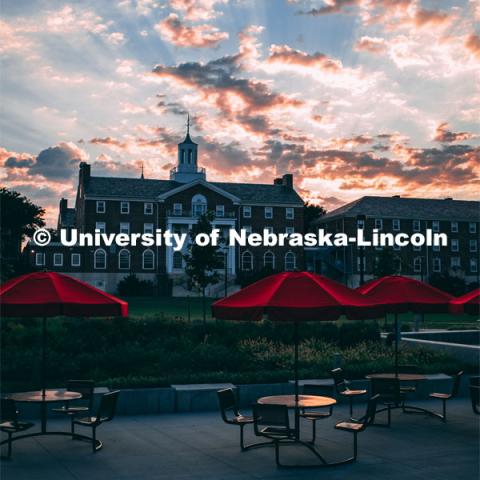 Exterior view of Neihardt Residential Center and the outdoor seating from Cather Dinning Hall. July 25, 2019. Photo by Justin Mohling / University Communication.