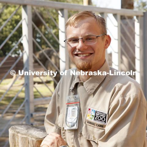 Stefan Lechnowsky, a senior Fisheries and Wildlife major at Nebraska, helps look after elephants during his internship this summer at Omaha's Henry Doorly Zoo and Aquarium after an early summer study abroad studying them in Africa. July 29, 2019. Photo by Craig Chandler / University Communication.