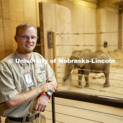 Stefan Lechnowsky, a senior Fisheries and Wildlife major at Nebraska, helps look after elephants during his internship this summer at Omaha's Henry Doorly Zoo and Aquarium after an early summer study abroad studying them in Africa. July 29, 2019. Photo by Craig Chandler / University Communication.