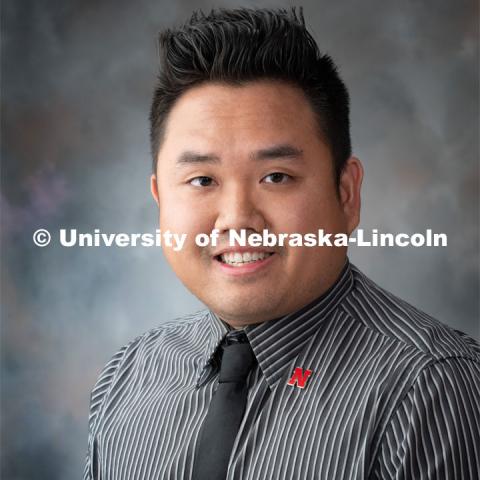 Studio portrait of Donny Bui, Academic Success Coach for First Year Experience and Transition Programs. August 12, 2019. Photo by Greg Nathan / University Communication.