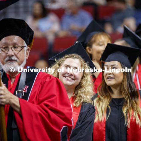 Grace Bradford smiles as she enters the arena. 2019 Summer Commencement at Pinnacle Bank Arena. August 17, 2019. Photo by Craig Chandler / University Communication.