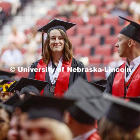 Chancellor's Scholars Amanda Kowalewski and Jordan Redler stand as they are honored during the ceremony. 2019 Summer Commencement at Pinnacle Bank Arena. August 17, 2019. Photo by Craig Chandler / University Communication.