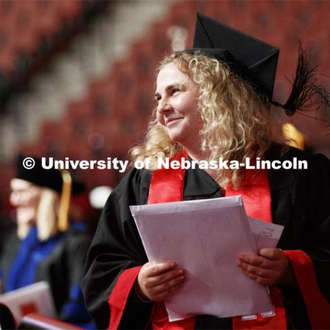 Grace Bradford smiles at her friends and family after receiving her degree. 2019 Summer Commencement at Pinnacle Bank Arena. August 17, 2019. Photo by Craig Chandler / University Communication.