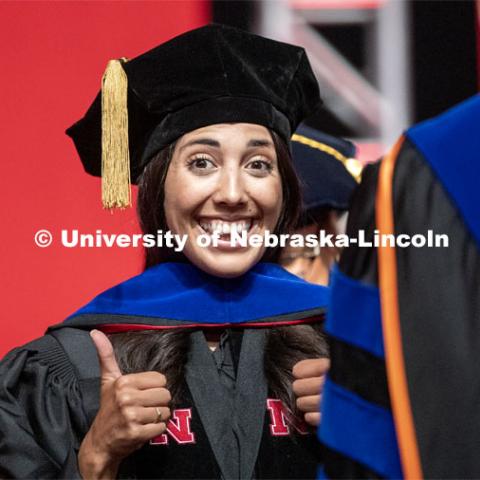 Michelle Haikalis celebrates her doctoral hooding. 2019 Summer Commencement at Pinnacle Bank Arena. August 17, 2019. Photo by Craig Chandler / University Communication.