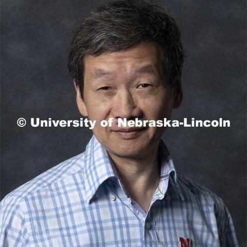 Studio portrait of Dongchu Sun, Research Professor, Statistics. New Faculty. August 21, 2019. Photo by Greg Nathan / University Communication Photography.