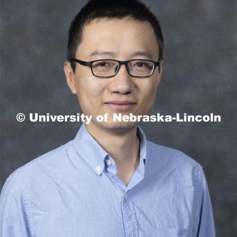 Studio portrait of Ruizhi Zhang, Assistant Professor, Statistics. New Faculty. August 21, 2019. Photo by Greg Nathan / University Communication Photography.