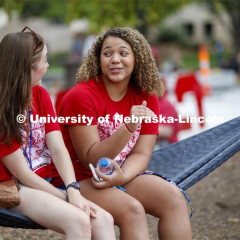 Caressa Jones of Omaha talks with Sarah Baker of Colorado Springs at the Big Red Welcome, Chancellor's BBQ for incoming freshman and new students on the greenspace by the Memorial Union. August 23, 2019. Photo by Craig Chandler / University Communication.