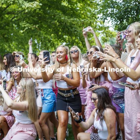 Alpha Xi Delta members photograph the group of new members. Sorority Bid Day. August 24, 2019. Photo by Craig Chandler / University Communication.