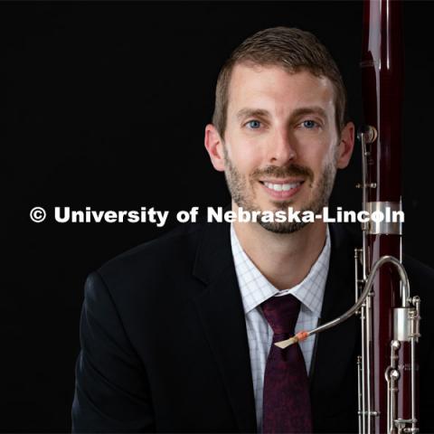 Studio portrait of Nathan Koch, Assistant Professor for the Glenn Korff School of Music. August 29, 2019. Photo by Greg Nathan / University Communication.