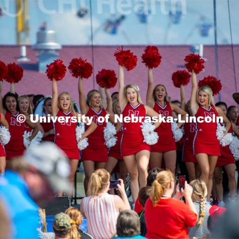 Husker cheerleaders at the Nebraska State Fair pep rally. The University of Nebraska represents and celebrates their 150th year anniversary at the Nebraska State Fair in Grand Island, Nebraska. August 1, 2019. Photo by Justin Mohling for University Communication.