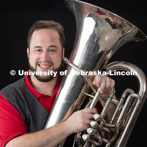 Studio portrait of Ravil Atlas, Lecturer in Music, Tuba/Euphonium, Glenn Korff School of Music. September 5, 2019. Photo by Greg Nathan / University Communication.