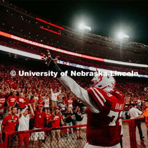 Darrion Daniels celebrates with crowd at the Nebraska vs. Northern Illinois football game. September 14, 2019. Photo by Justin Mohling / University Communication.