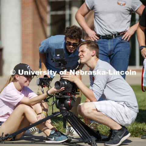 Students in THEA 426 - Lighting for Film, practice lighting techniques while shooting outside the visitor’s center. September 17, 2019. Photo by Craig Chandler / University Communication.