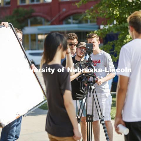 Students in THEA 426 - Lighting for Film, practice lighting techniques while shooting outside the visitor’s center. September 17, 2019. Photo by Craig Chandler / University Communication.