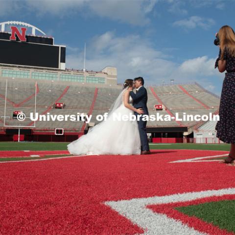 Homecoming week is a special time for Laura and Shayne Arriola. In 2017, the two were crowned homecoming king and queen, and Shayne proposed in front of 90,000 Husker fans. Two weeks ago, Laura and Shayne were married and celebrated their wedding with photos (taken by Brooke LaBenz Graham) at Memorial Stadium. September 21, 2019. Photo by Gregory Nathan / University Communication.