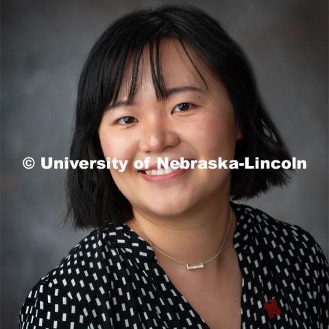 Studio portrait of Liwei He, Accounting. September 24, 2019. Photo by Gregory Nathan / University Communication.