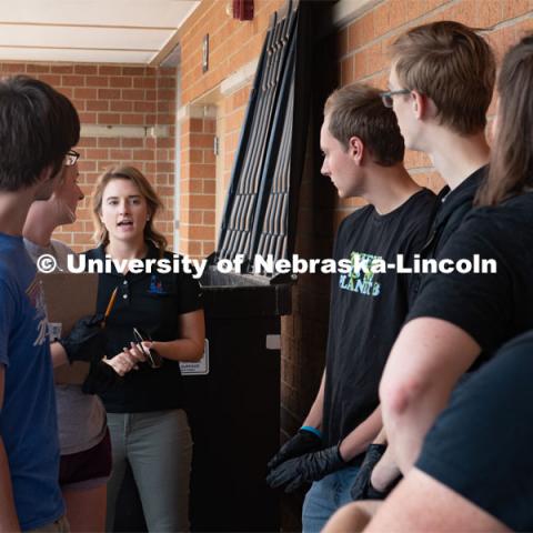 Brittney Albin (center), sustainability coordinator for Lincoln Public Schools, speaks with University of Nebraska-Lincoln students prior to starting a waste audit at Lincoln Southwest High School. September 25, 2019. Photo by Greg Nathan / University Communication.