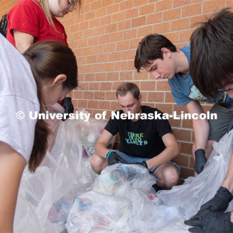 Students from the Environmental Studies Orientation class, sort refuse from lunch at Lincoln Southwest High School. September 25, 2019. Photo by Greg Nathan / University Communication.