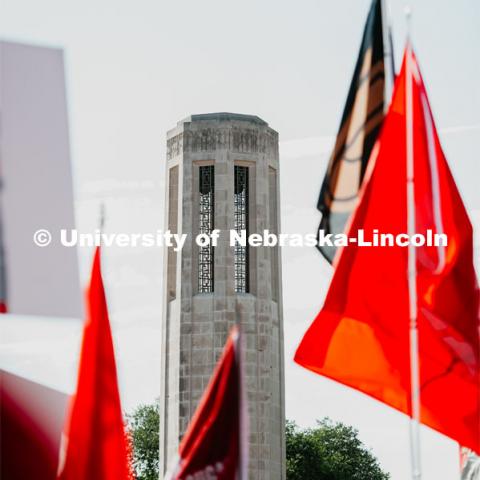 Mueller Tower with GameDay flags in front. Nebraska vs. Ohio State University football game. September 28, 2019. Photo by Justin Mohling / University Communication.