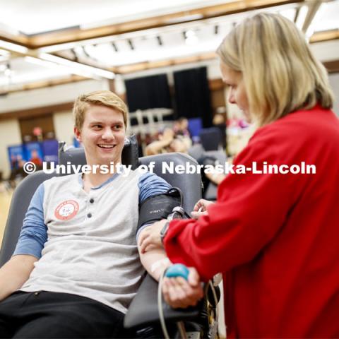 Zak Folchert, junior from North Platte, donates blood at the ASUN blood drive. Bleed Husker Red: Global Blood Drive at the Nebraska Union, Centennial Room. October 2, 2019. Photo by Craig Chandler / University Communication.