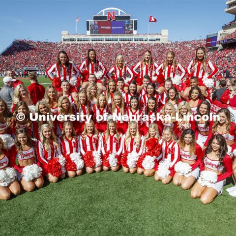 Members of the Scarlet dance team and the Cheer Squad pose for a group picture. Nebraska vs. Northwestern University football game. Homecoming 2019. October 5, 2019.  Photo by Craig Chandler / University Communication.