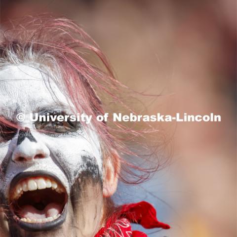 Fans with faces painted like skeletons. Nebraska vs. Northwestern University football game. Homecoming 2019. October 5, 2019.  Photo by Craig Chandler / University Communication.