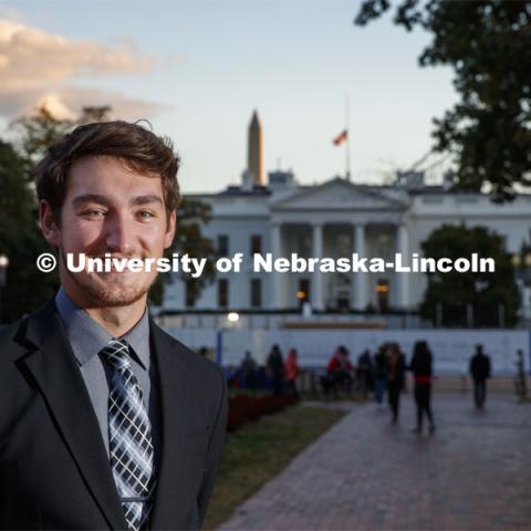 Ryan Bentz, Junior in Political Science major, outside the White House and the Eisenhower Executive Office Building where he works in Washington D.C.  October 17, 2019. Photo by Craig Chandler / University Communication.