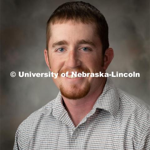 Studio portrait of Austin Holliday, Cow/Calf Unit Manager, Animal Science. October 22, 2019. Photo by Greg Nathan / University Communication.  