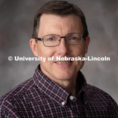 Studio portrait of Tom Albin, Operations Coordinator, Computer Engineering Science. October 28, 2019. Photo by Gregory Nathan / University Communication.