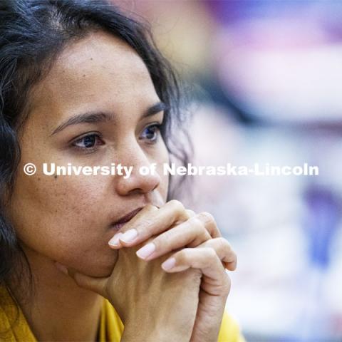 Emy Kata, Graduate Student in Educational Administration, listens to Marco Barker give the State of Diversity. October 29, 2019. Photo by Craig Chandler / University Communication.