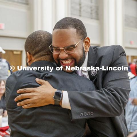 Maurice Stinnett, Vice President for Diversity and Inclusion with the BSE Global, hugs Calvin Sandidge following Stinnett's key-note at the State of Diversity summit. October 29, 2019. Photo by Craig Chandler / University Communication.