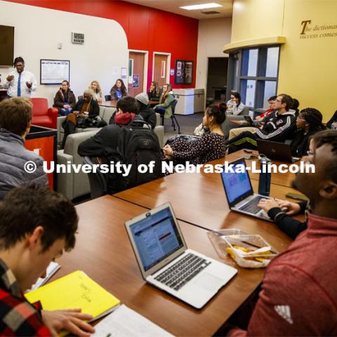 Kevin Reese, Program Coordinator-NU Connections, Office of Academic Success and Intercultural Services, leads the discussion at Dish it Up during Peace and Civility week in the Gaughan Multicultural Center. November 12, 2019. Photo by Craig Chandler / University Communication.