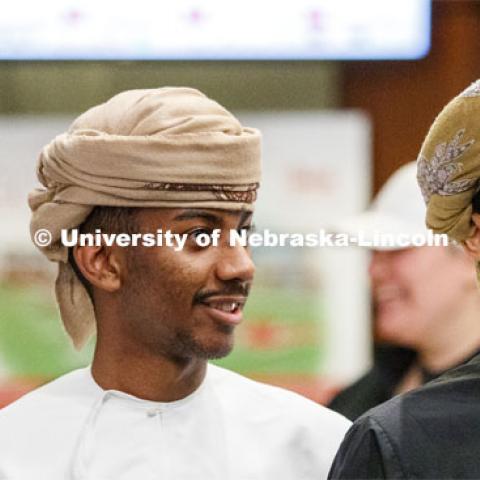 Omani students watch the performances. Global Huskers Festival, a multicultural festival provides attendees the chance to explore the world through informational booths that will have food, cultural décor, art, and more, each hosted by UNL students from those culture. November 19, 2019. Photo by Craig Chandler / University Communication.