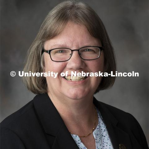 Studio portrait of Diane Holtorf, Senior Internal Auditor for Central Administration. November 20, 2019. Photo by Gregory Nathan / University Communication.