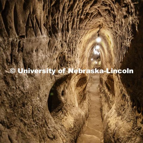 A passage through Robbers Cave. Professor Ricky Wood uses LIDAR to digitally map Robbers Cave in Lincoln. November 22, 2019. Photo by Craig Chandler / University Communication.