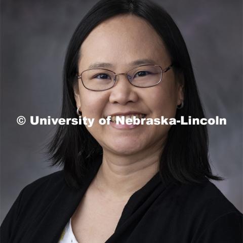 Studio portrait of Mai Dang, Financial Associate for the Animal Science Business Center. November 26, 2019. Photo by Gregory Nathan / University Communication.