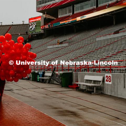 Getting first touchdown ballons ready for game. Nebraska vs. Iowa State University football game. November 29, 2019. Photo by Justin Mohling / University Communication.