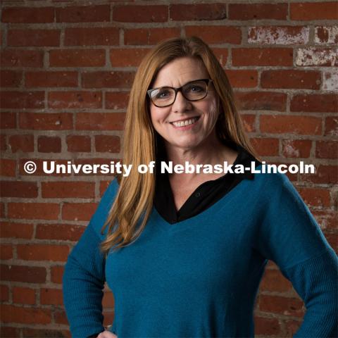 Studio portrait of Carrie Hulsey-Greene, Director of Reputation Public Safety Communication, Office of University Communication. December 12, 2019. Photo by Greg Nathan / University Communication.