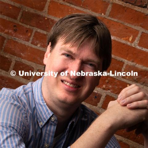 Studio portrait of Sean Hagewood, Coordinator of News and Information, Office of University Communication. December 17, 2019. Photo by Greg Nathan / University Communication.