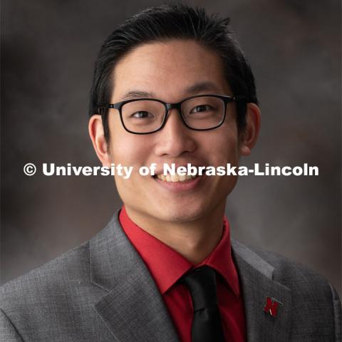 Studio portrait of John Tessalee, Program Coordinator, OASIS. December 17, 2019. Photo by Greg Nathan / University Communication.