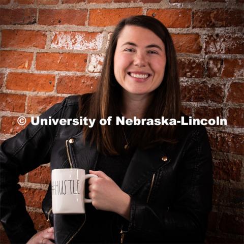 Studio portrait of Taylor DeMaro, Senior Manager of Integrated Content, Office of University Communication. December 18, 2019. Photo by Greg Nathan / University Communication.