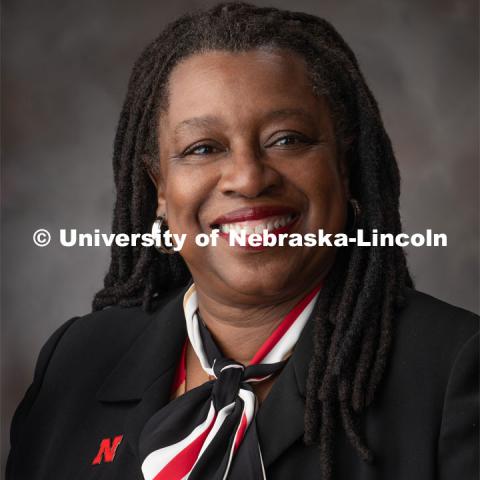 Studio portrait of Karen Kassebaum, Director, Staff Diversity and Inclusion
Human Resources, OASIS. December 18, 2019. Photo by Greg Nathan / University Communication.