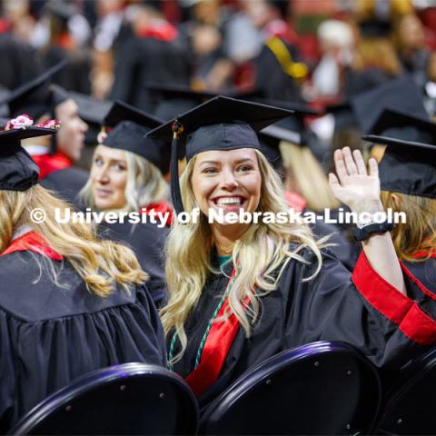 Kaylee Easter waves to family and friends. December Undergraduate commencement at Pinnacle Bank Arena. December 21, 2019. Photo by Craig Chandler / University Communication.