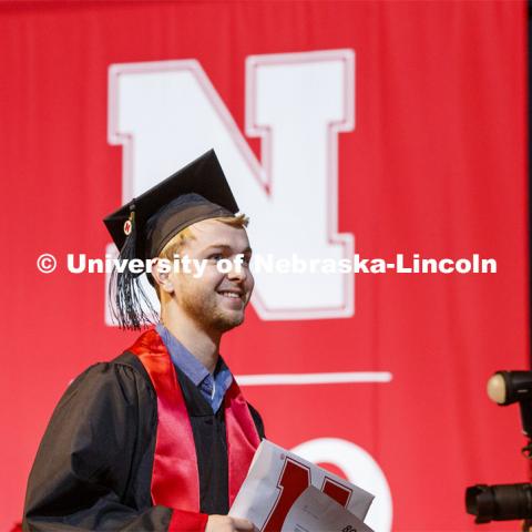 Tyler Hattan received his Business Administration degree from the College of Business. December Undergraduate commencement at Pinnacle Bank Arena. December 21, 2019. Photo by Craig Chandler / University Communication.