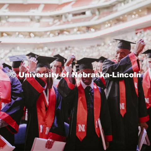 Students move their tassels to the left to signify they have graduated. December Undergraduate commencement at Pinnacle Bank Arena. December 21, 2019. Photo by Craig Chandler / University Communication.