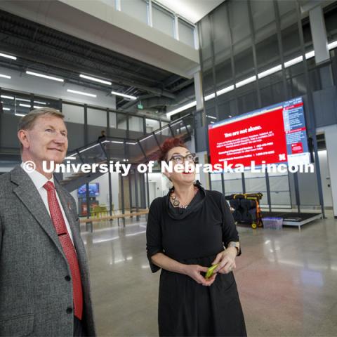 NU President Ted Carter listens as Megan Elliott, founding director of the Johnny Carson Center for Emerging Media Arts, describes the tech the new center has. NU President Ted Carter tours UNL campuses. January 17, 2020. Photo by Craig Chandler / University Communication.